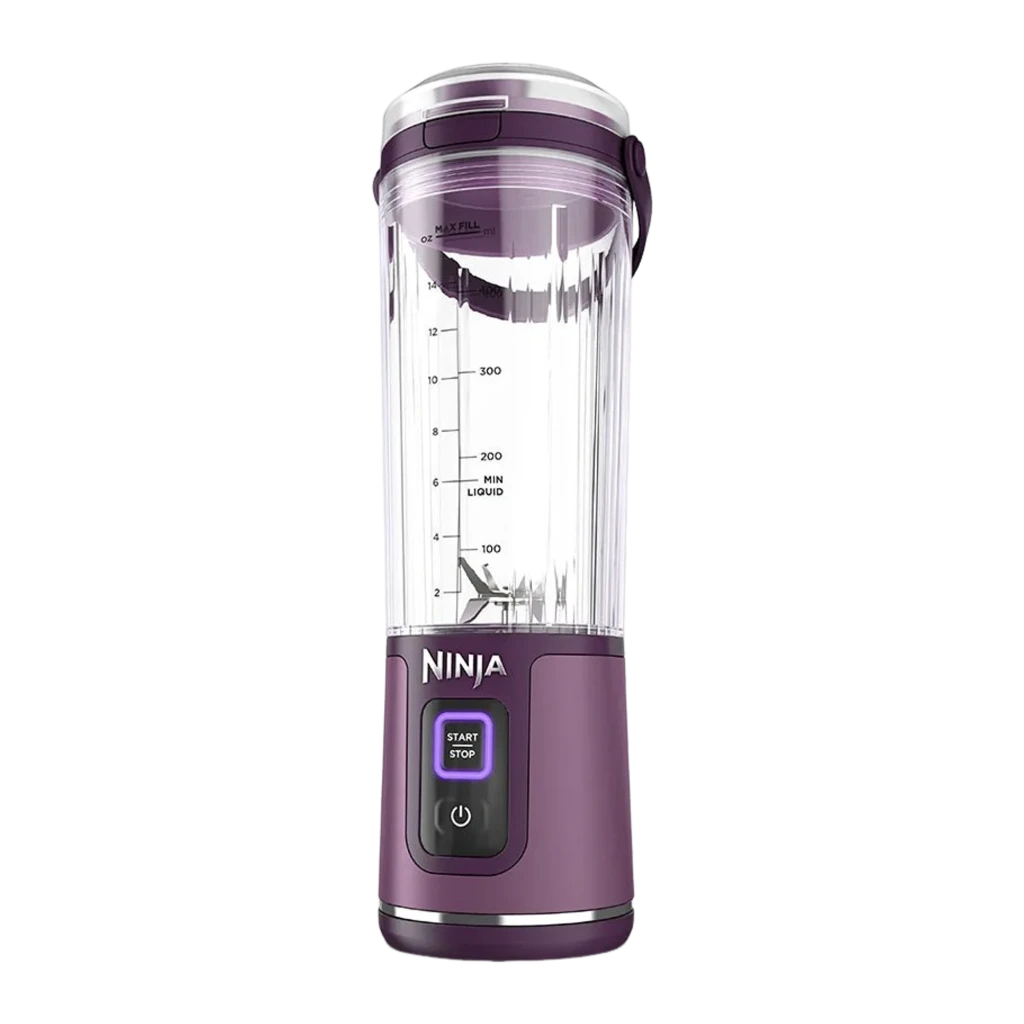 Ninja Blast BC151EU 530ml violet, vue de face: bol transparent avec mangue et glaçons, base avec boutons Start/Stop - Ítem1