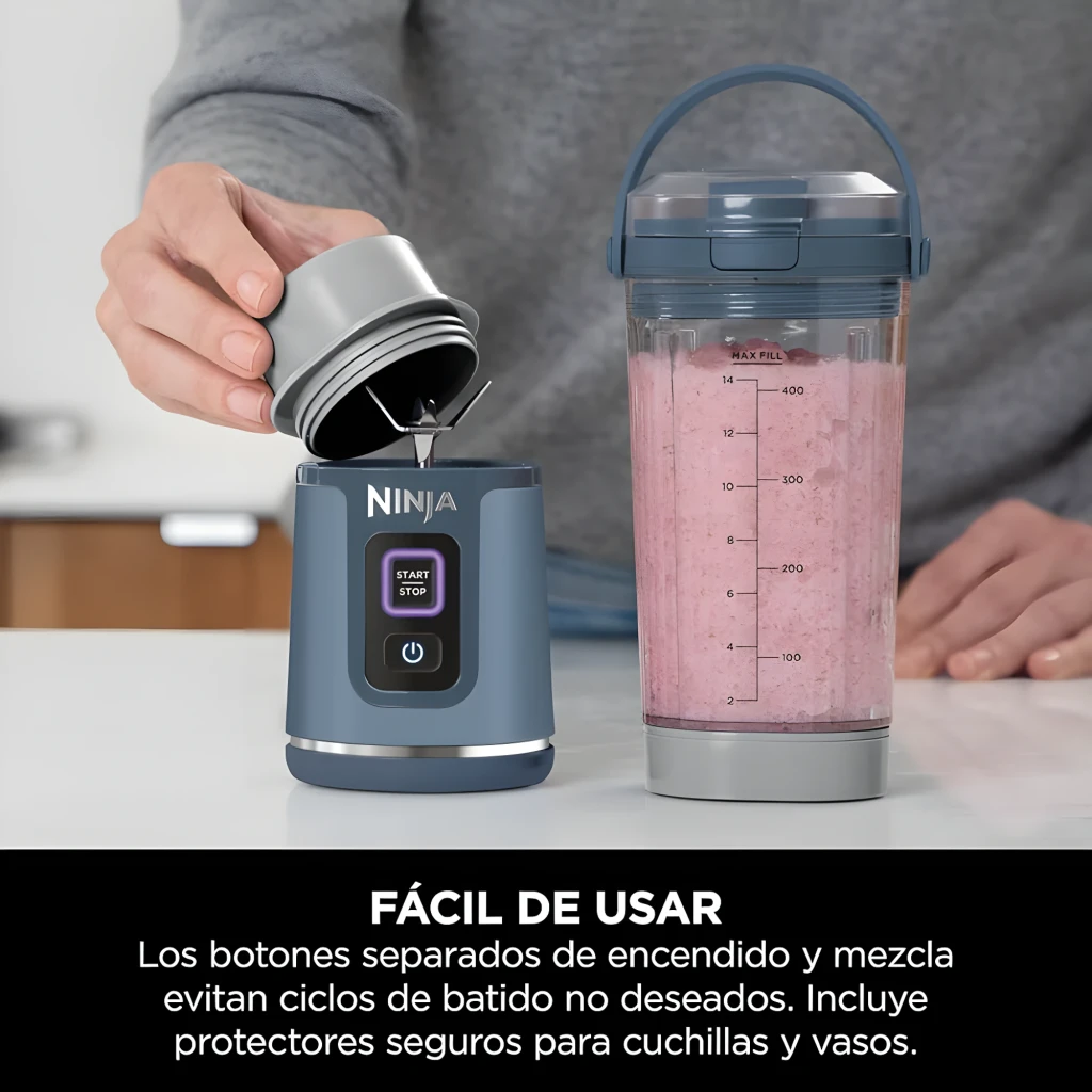 Ninja Blast BC151EU 530ml bleu, vue de face: bol transparent avec épinards, myrtilles et fruits, base bleue avec boutons - Ítem3