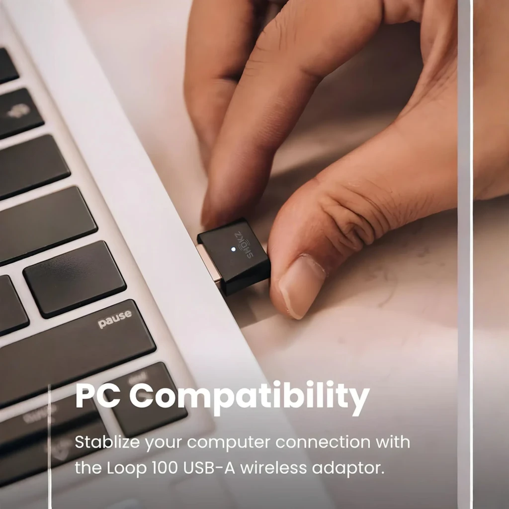 Shokz Loop 100 USB-A Adapter negro, vista frontal: conector USB-A plateado y cuerpo negro con puerto USB-C inferior - Ítem2