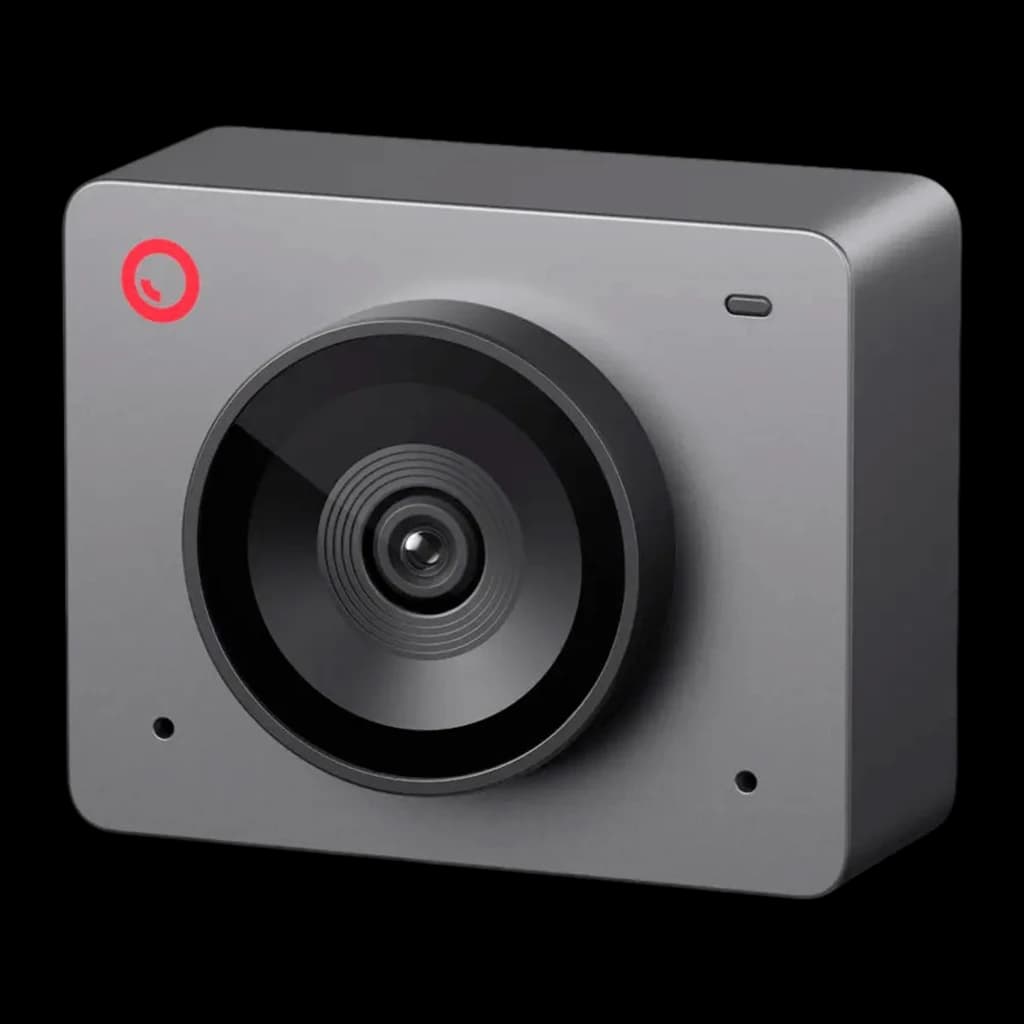 OBSBOT Meet SE 1080P gris, vista frontal en ángulo: lente central, logo rojo y lateral derecho visibles