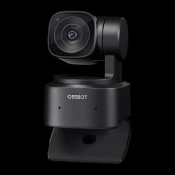 OBSBOT Webcam Tiny SE Full HD negro, vista en ángulo: soporte de clip inferior, LED azul encendido y cabezal PTZ