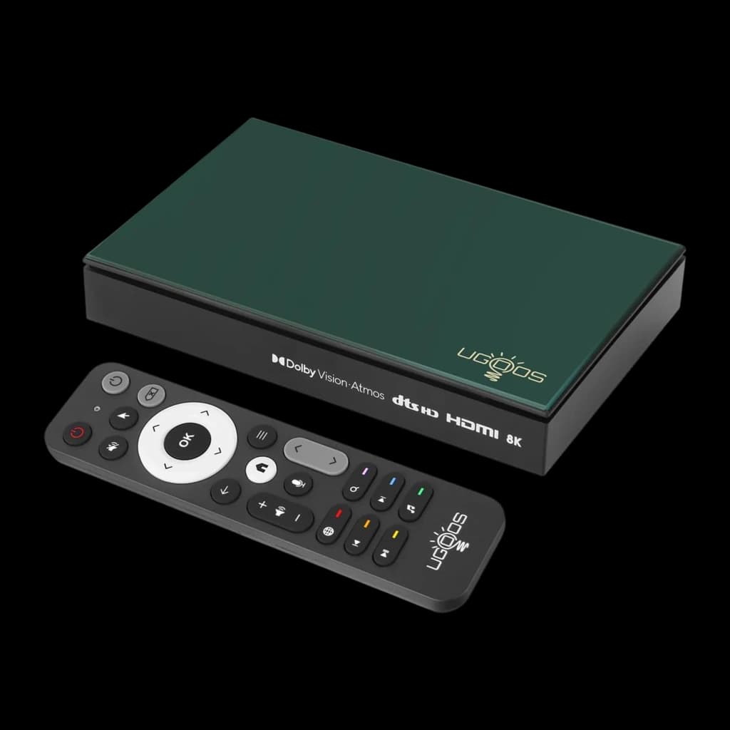 Boîtier Ugoos SK1 Lite vert avec logo, ports HDMI et mentions Dolby Vision Atmos dts. Télécommande compacte noire à grandes touches et icônes colorées.