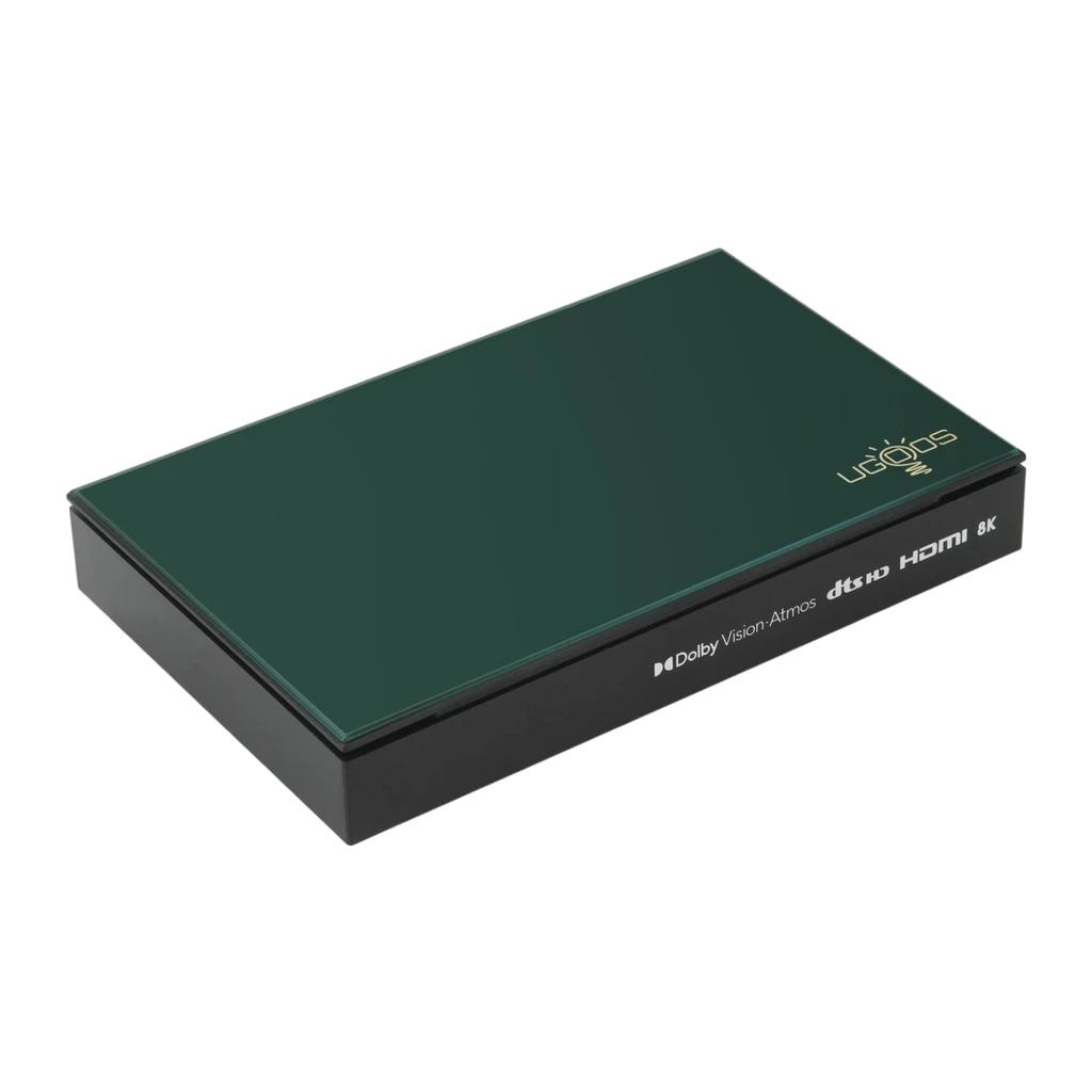 Reproductor Ugoos SK1 Lite compacto en verde con logo dorado, puertos HDMI visibles y mando a distancia con botones multimedia y atajos de apps - Ítem2