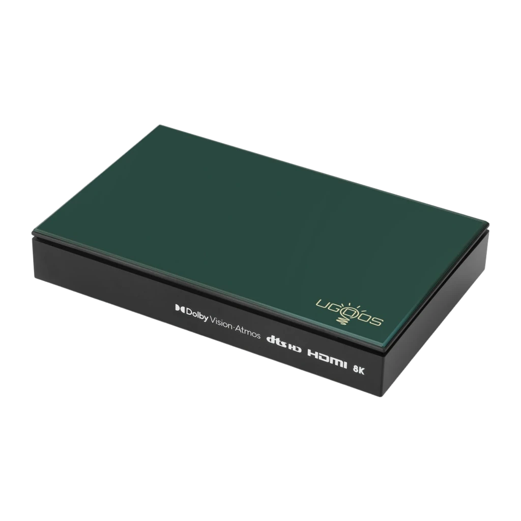 Reproductor Ugoos SK1 Lite compacto en verde con logo dorado, puertos HDMI visibles y mando a distancia con botones multimedia y atajos de apps - Ítem1