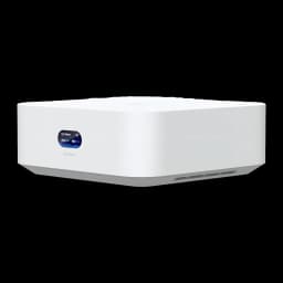 Router Ubiquiti UniFi Express 7 UX7 WiFi 7 blanco, diseño compacto con pantalla lateral azul que muestra estado y velocidad 10,7 Gbps, rejillas de ventilación