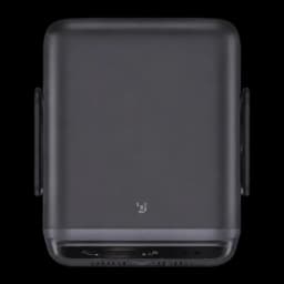 Boîtier du projecteur Wanbo Mozart 1S noir mat, compact avec poignées latérales, ports inférieurs visibles pour connectique et ventilation discrète