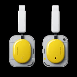 Nothing Headphone a Amarelo com design quadrado cinza e almofadas ovais amarelas brilhantes, arco branco acolchoado, estilo moderno e minimalista