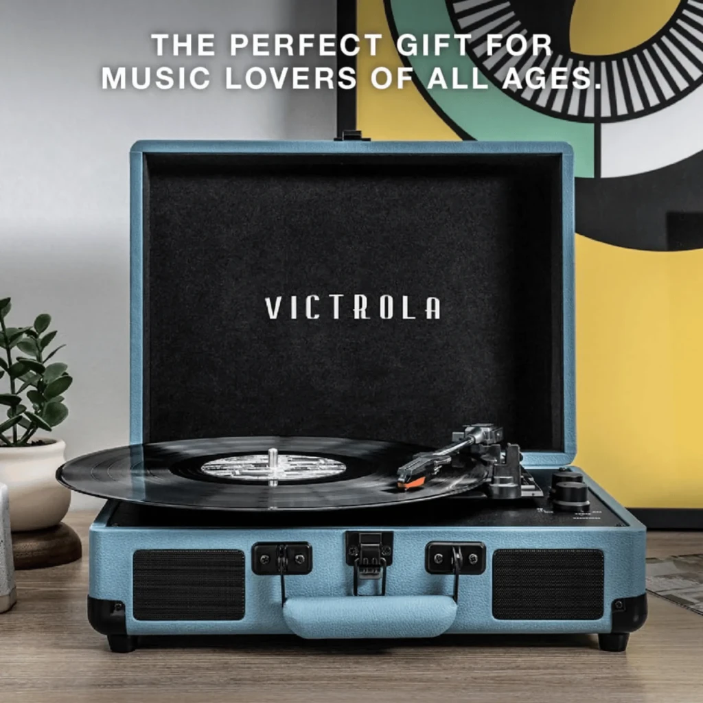 Tocadiscos Victrola Journey VSC-550BT tipo maleta color turquesa, tapa abatible blanca, plato con vinilo, asa negra y altavoces frontales integrados - Ítem2