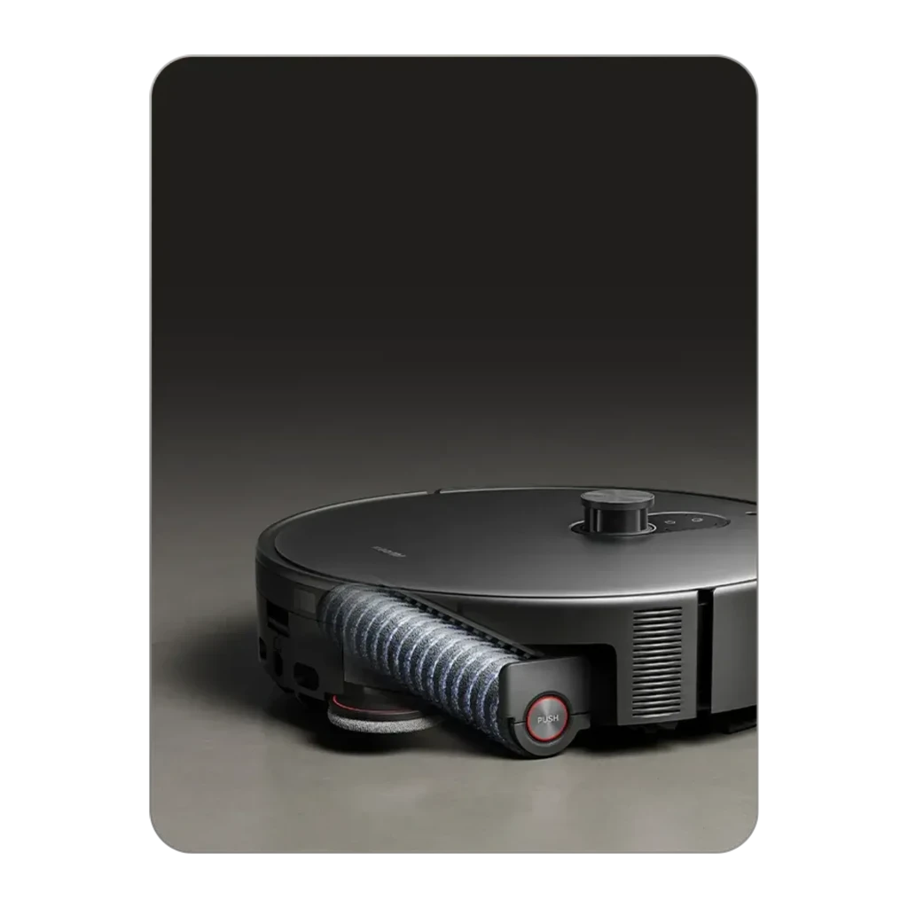 Estación base gris con robot aspirador Xiaomi Robot Vacuum 6 Max dToF + Triple Cámara AI; base alta y rectangular, robot circular con sensores frontales - Ítem10