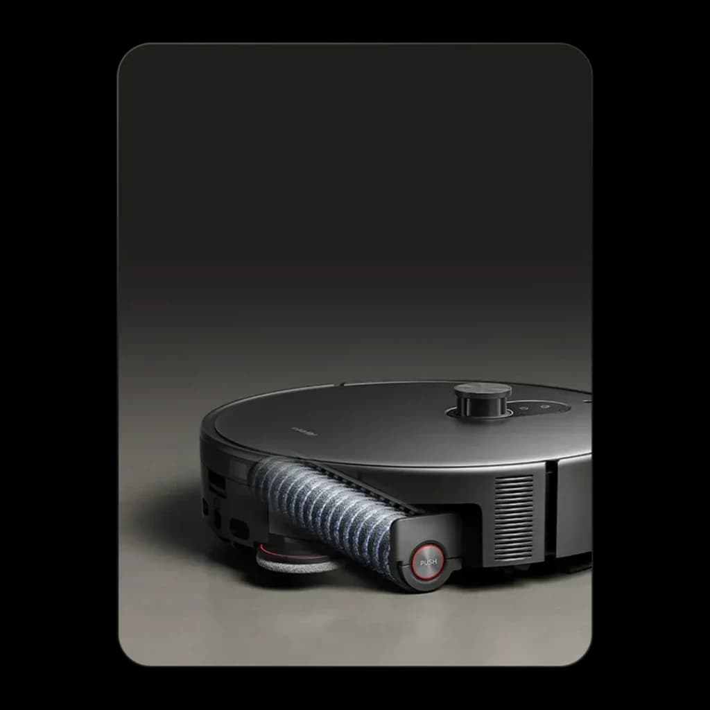 Robot Aspirador Xiaomi Robot Vacuum 6 Max dToF + Triple Cámara AI en negro, cuerpo circular bajo, torreta LiDAR superior, cepillo lateral y rodillo central