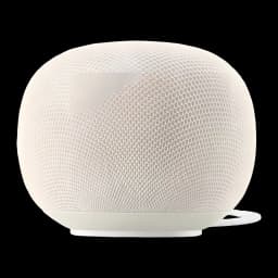 Enceinte connectée blanche compacte en forme de dôme, maillage textile fin, base discrète et câble arrière, design minimaliste pour intérieur moderne