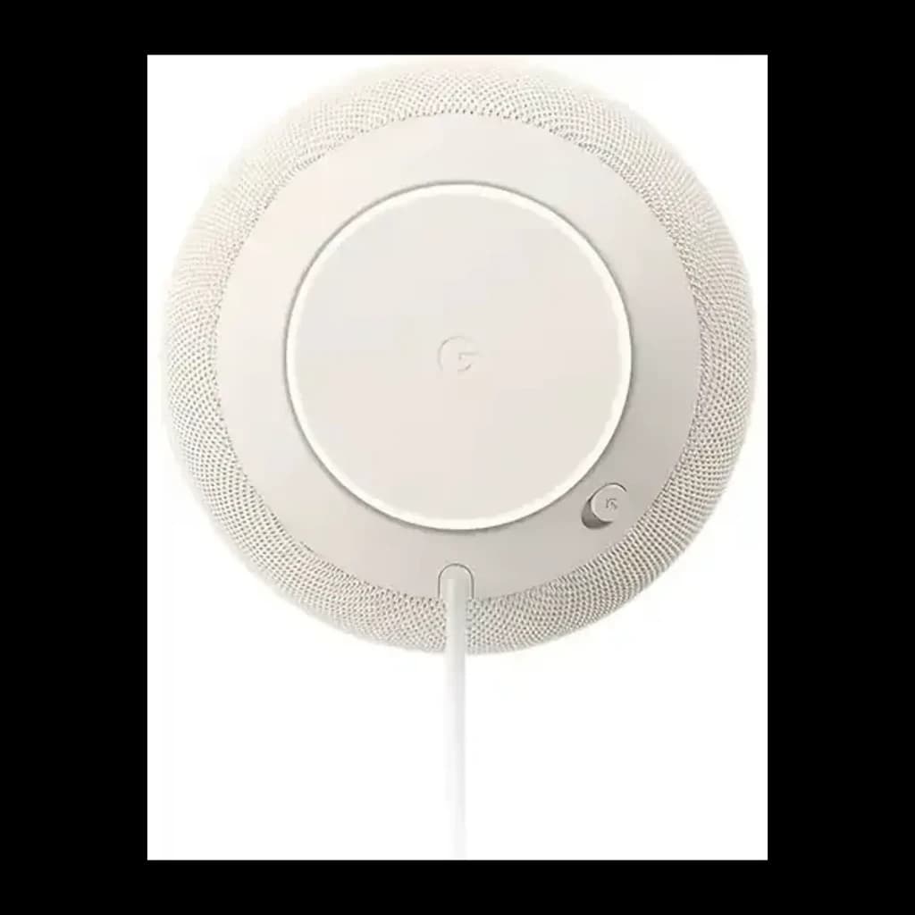 Enceinte blanche compacte en tissu maillé, surface supérieure circulaire avec logo G, bouton latéral discret et câble d’alimentation blanc visible