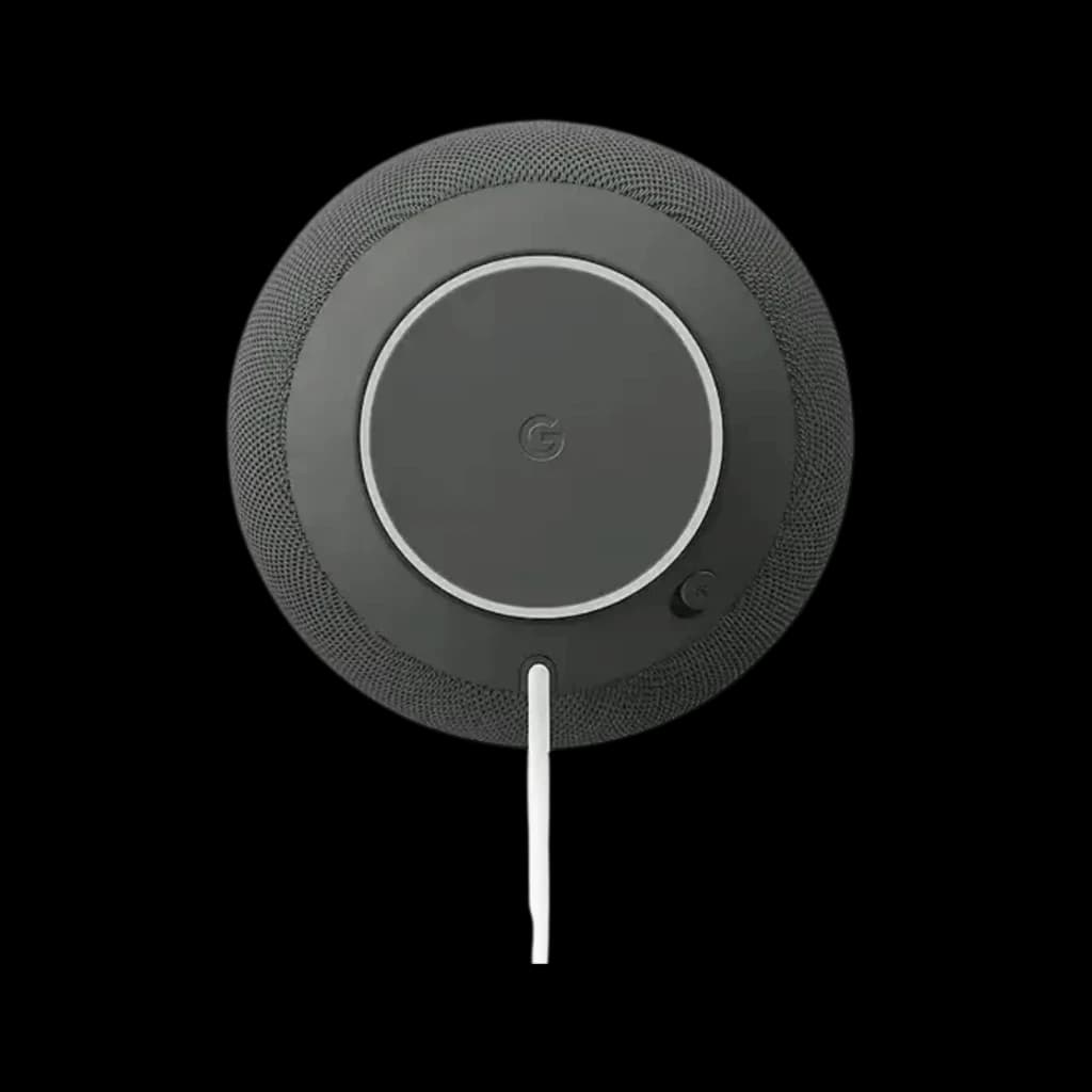 Enceinte connectée Google Home avec Google Assistant grise, vue arrière circulaire, grille tissu sombre, anneau LED, logo G centré, câble d’alimentation