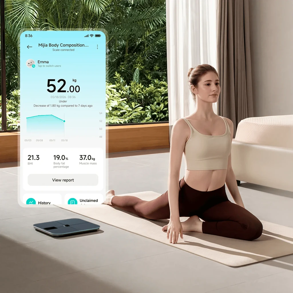 Balance intelligente Xiaomi Body Composition Scale S400 Pro, surface noire mate avec croix discrète, écran numérique central affichant le poids, logo Mi au - Ítem4