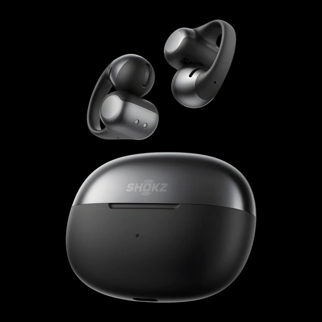 Auriculares SHOKZ OpenDots 2 negros tipo clip open-ear, diseño compacto y ergonómico, estuche de carga curvo en negro con logo SHOKZ en tapa