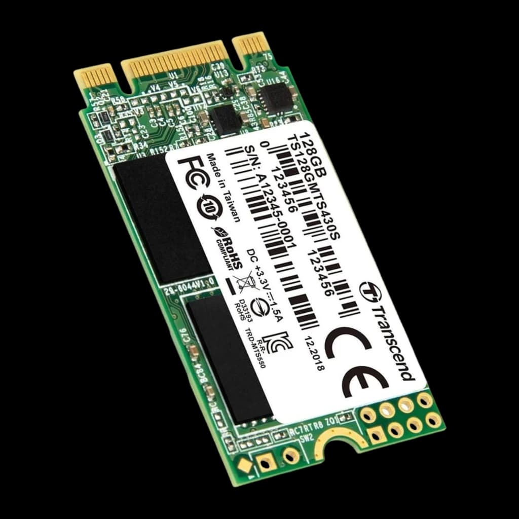Transcend 430S 128GB M.2, vue de face en angle: PCB vert avec étiquette blanche, connecteur doré et puces visibles