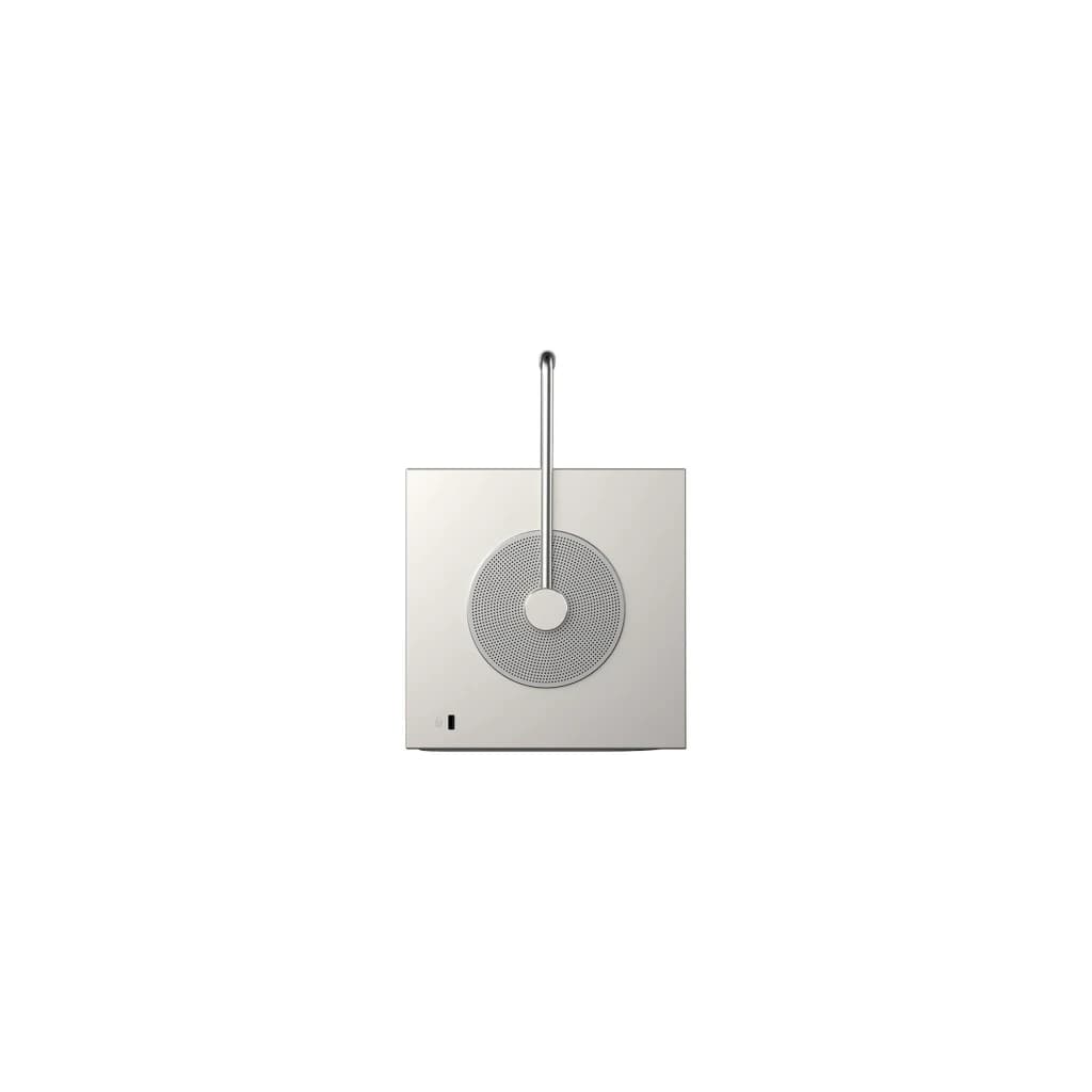 LG PU600U projecteur 4K UHD blanc, vue du dessus: grille circulaire du haut-parleur et antenne métallique
