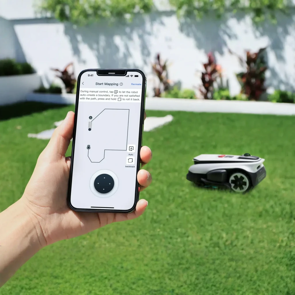 Ecovacs GOAT A1600 LiDAR PRO noir, vue avant en angle: capteur LiDAR, bouton STOP rouge, caméra frontale et trimmer TrueEdge - Ítem8