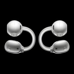 Auriculares open-ear prateados com design em clip curvo, duas unidades espelhadas com microfones e sensores visíveis, acabamento metálico elegante