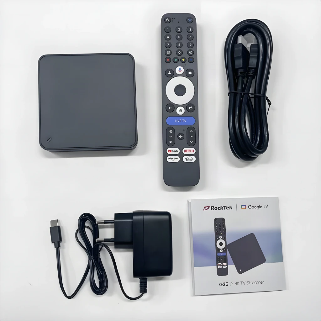 Leitor Multimédia RockTek G2S com box compacta preta, comando com botões dedicados, cabo HDMI, adaptador de energia e manual Google TV
