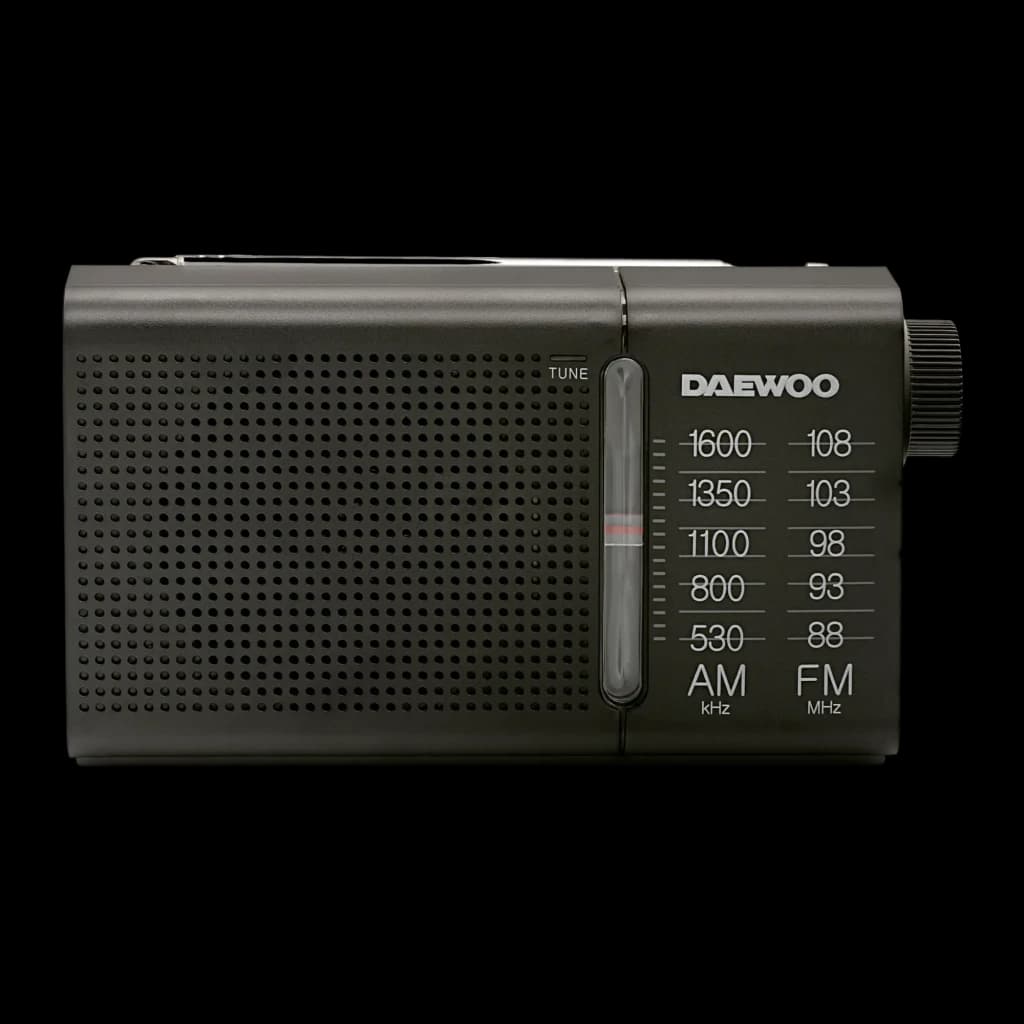 Radio portable Daewoo AM/FM à piles Noir DW1119, détail face avant: grille haut-parleur, cadran de syntonisation et échelle