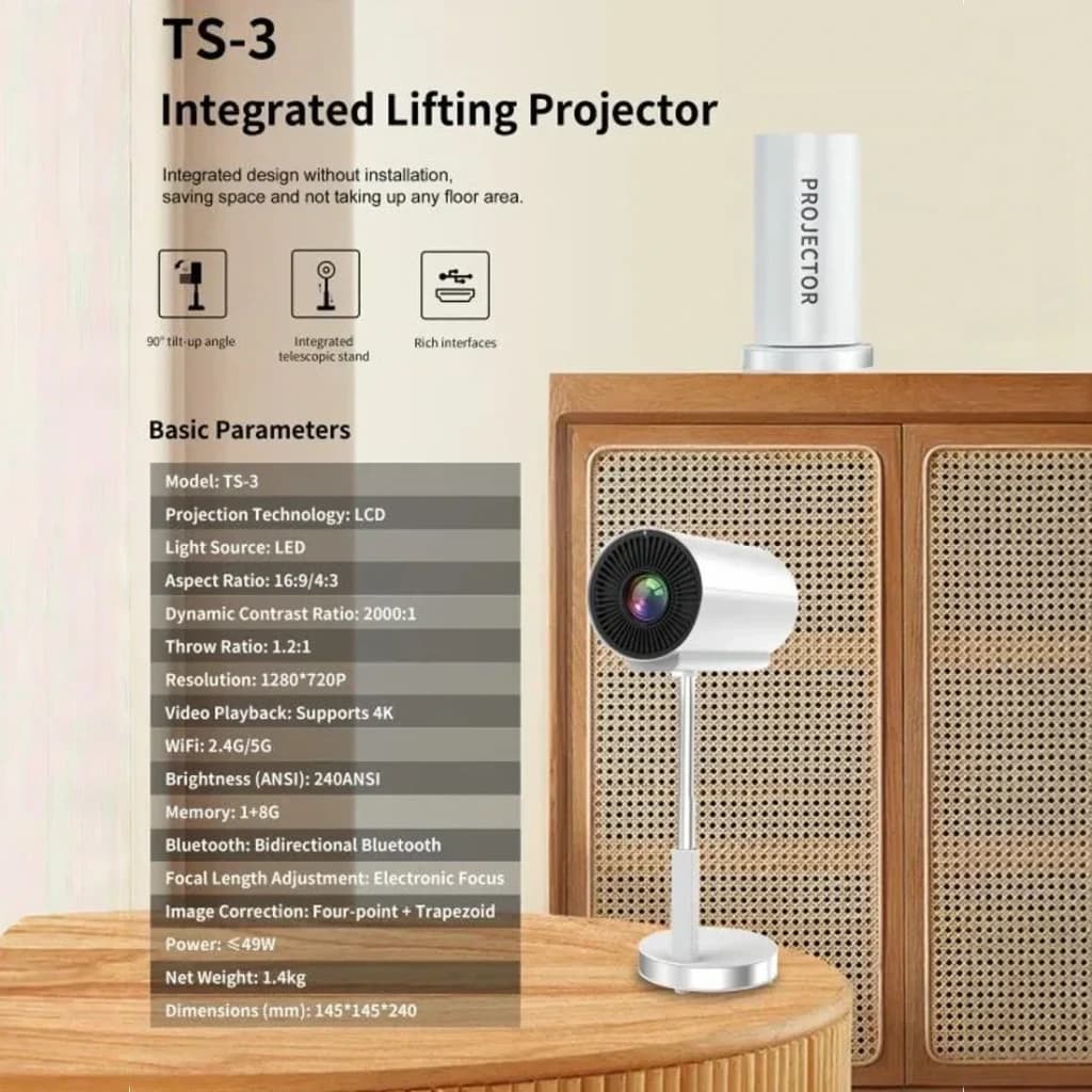 Proyector TS-3 plateado en soporte metálico, lente frontal con ventilación lateral, logo PROJECTOR en el cuerpo cilíndrico; diseño compacto y minimalista