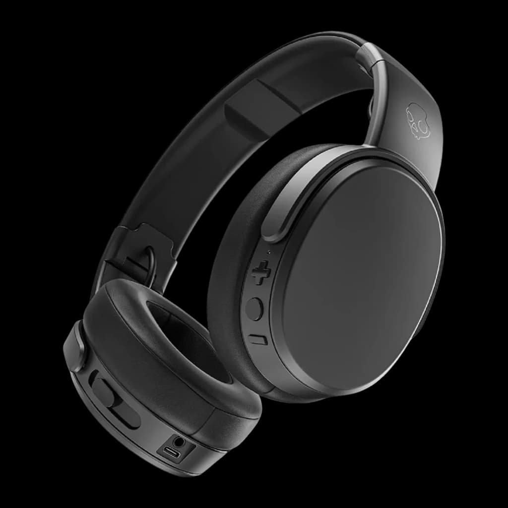 Skullcandy Crusher Wireless noir, vue latérale droite: ports jack et USB-C sur la base de l'écouteur droit visibles