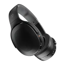 Skullcandy Crusher Wireless noir, vue latérale replié: logo crâne sur arceau, contrôles latéraux et détail orange visibles