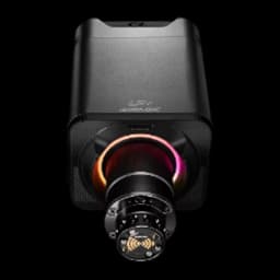 Simagic Alpha EVO Sport 9Nm preto, vista frontal: eixo QR com iluminação RGB laranja-rosa e logo Simagic