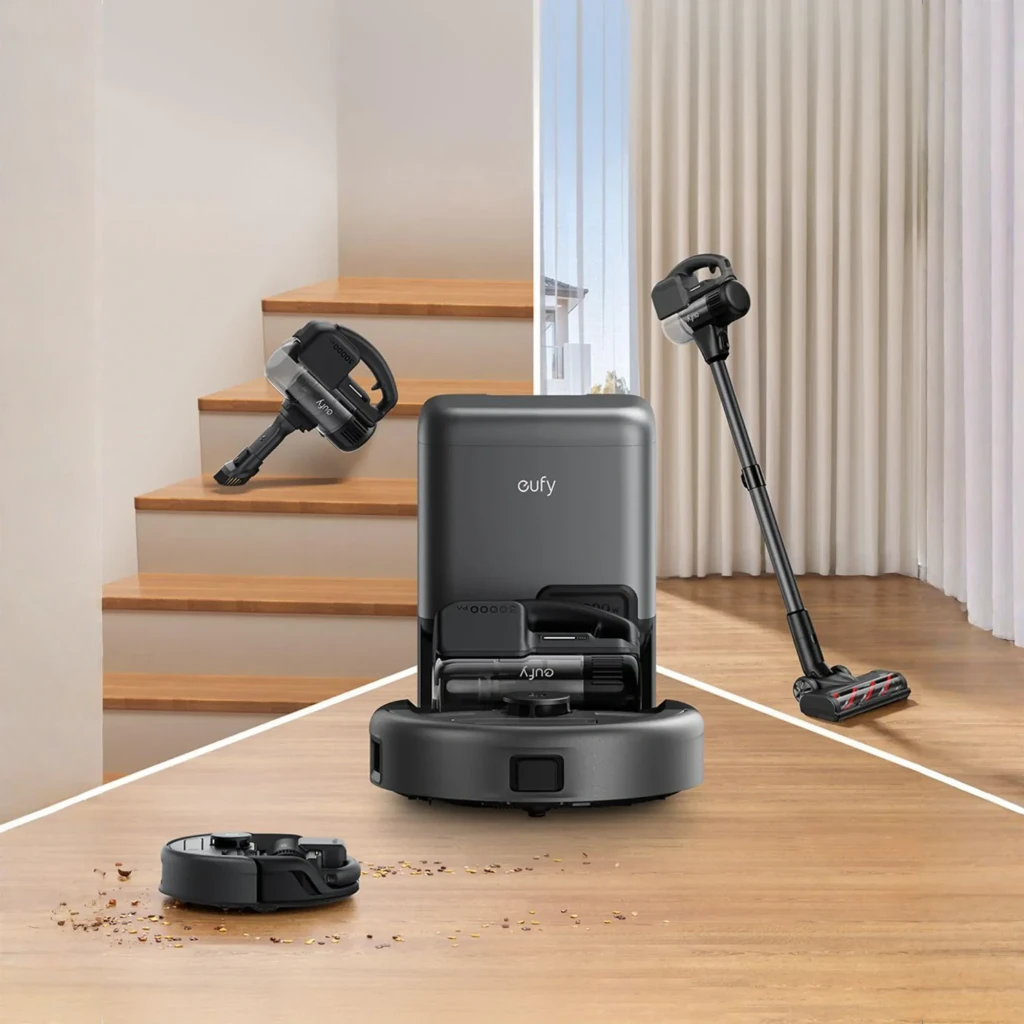 Anker Innovations Negro, vista secundaria: aspirador inalámbrico, base de carga y accesorio separados sobre fondo negro - Ítem3