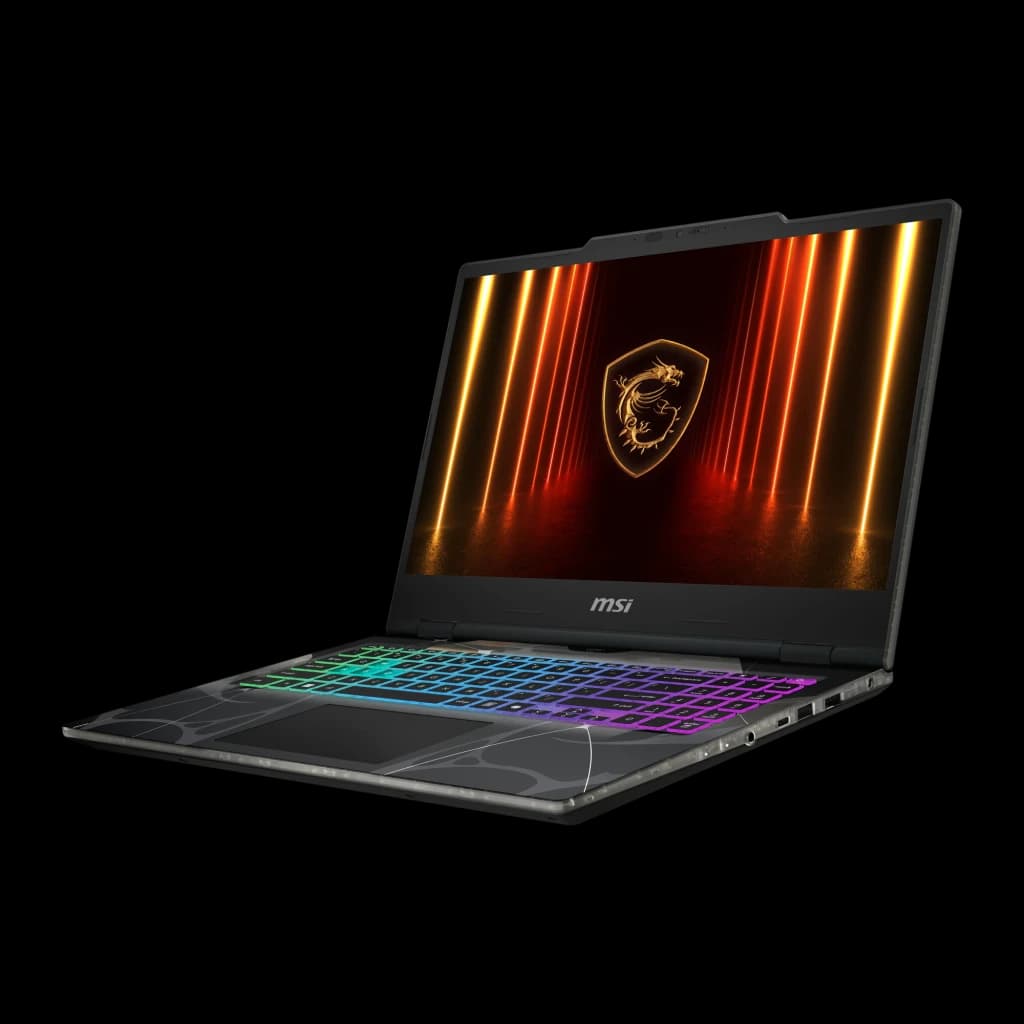MSI Cyborg A15 1TB noir, vue avant droite: ports latéraux visibles, clavier RGB et écran avec dragon doré
