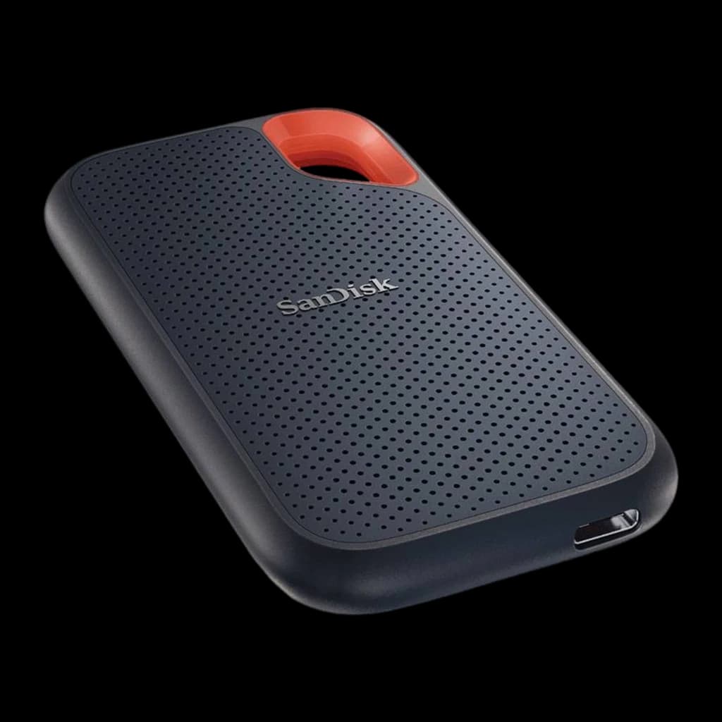 SanDisk Extreme Portable V2 4TB preto, vista superior em ângulo: porta USB-C visível na lateral e alça vermelha