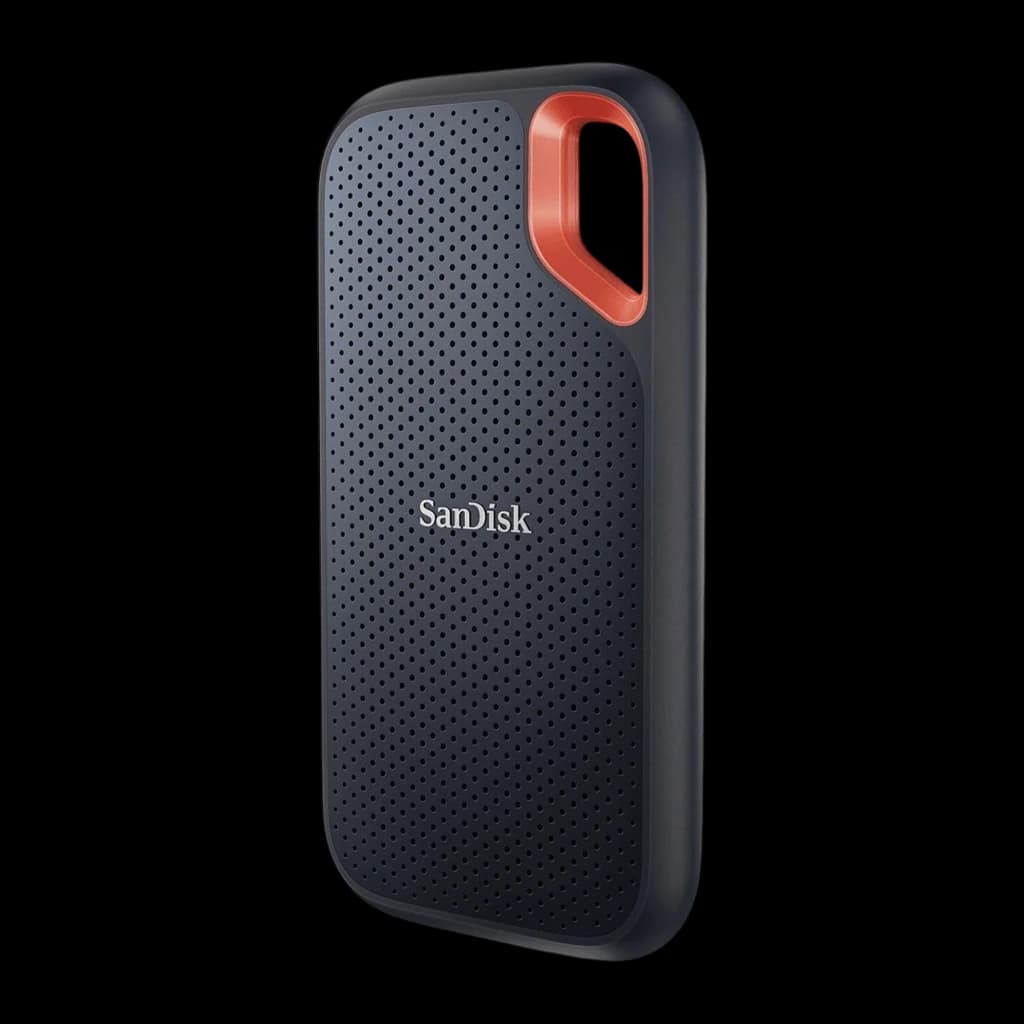 SanDisk Extreme Portable V2 4TB preto, vista frontal vertical: carcaça perfurada, alça vermelha superior e logo centralizado