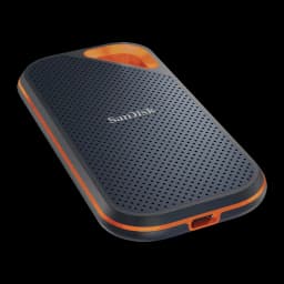 SanDisk SSD Extreme Pro V2 4TB preto laranja, vista em perspectiva: espessura, bordas laranjas e porta USB-C visível