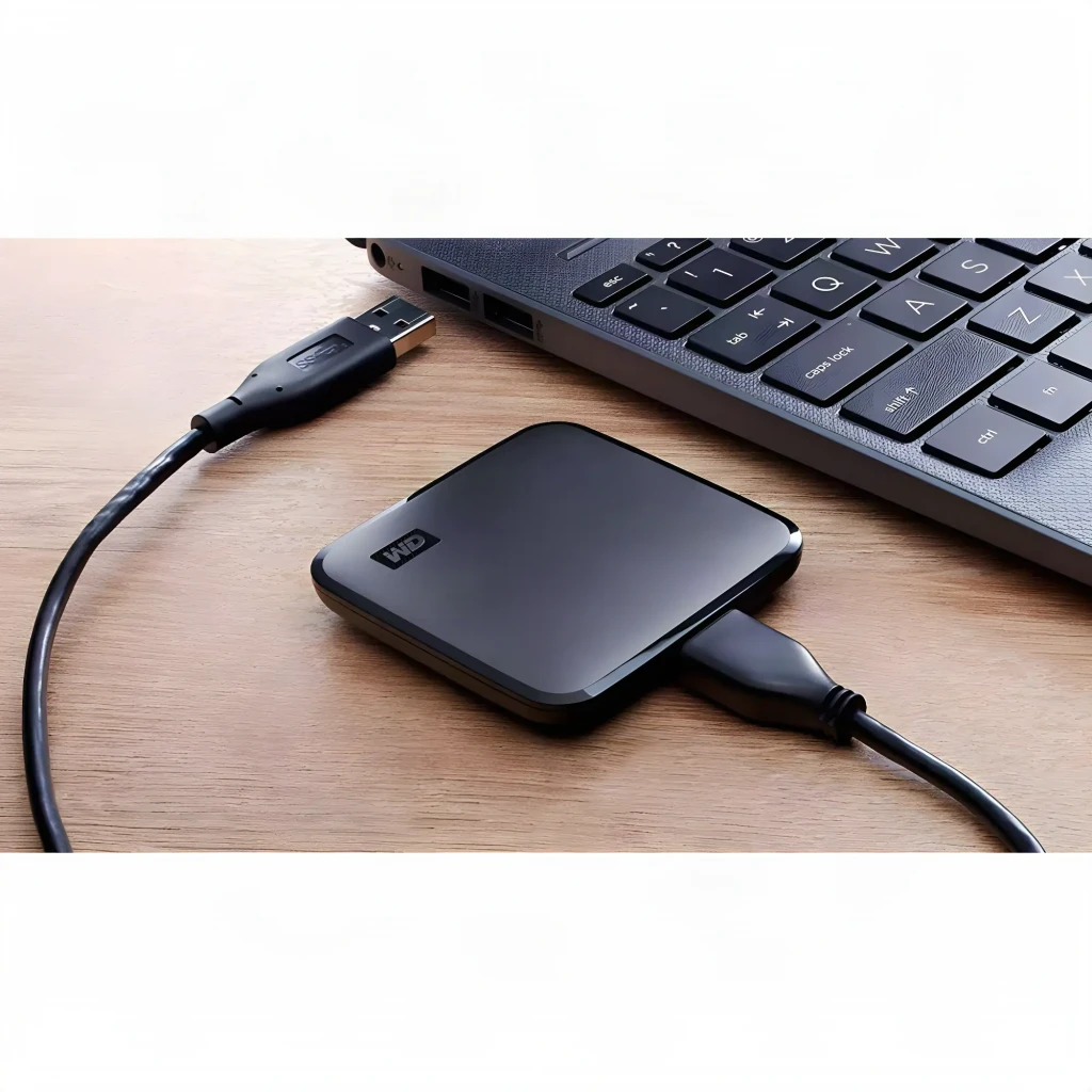 WD Elements SE WDBAYN0010BBK 1TB noir, vue de face: surface mate avec logo WD en relief et coins arrondis - Ítem4