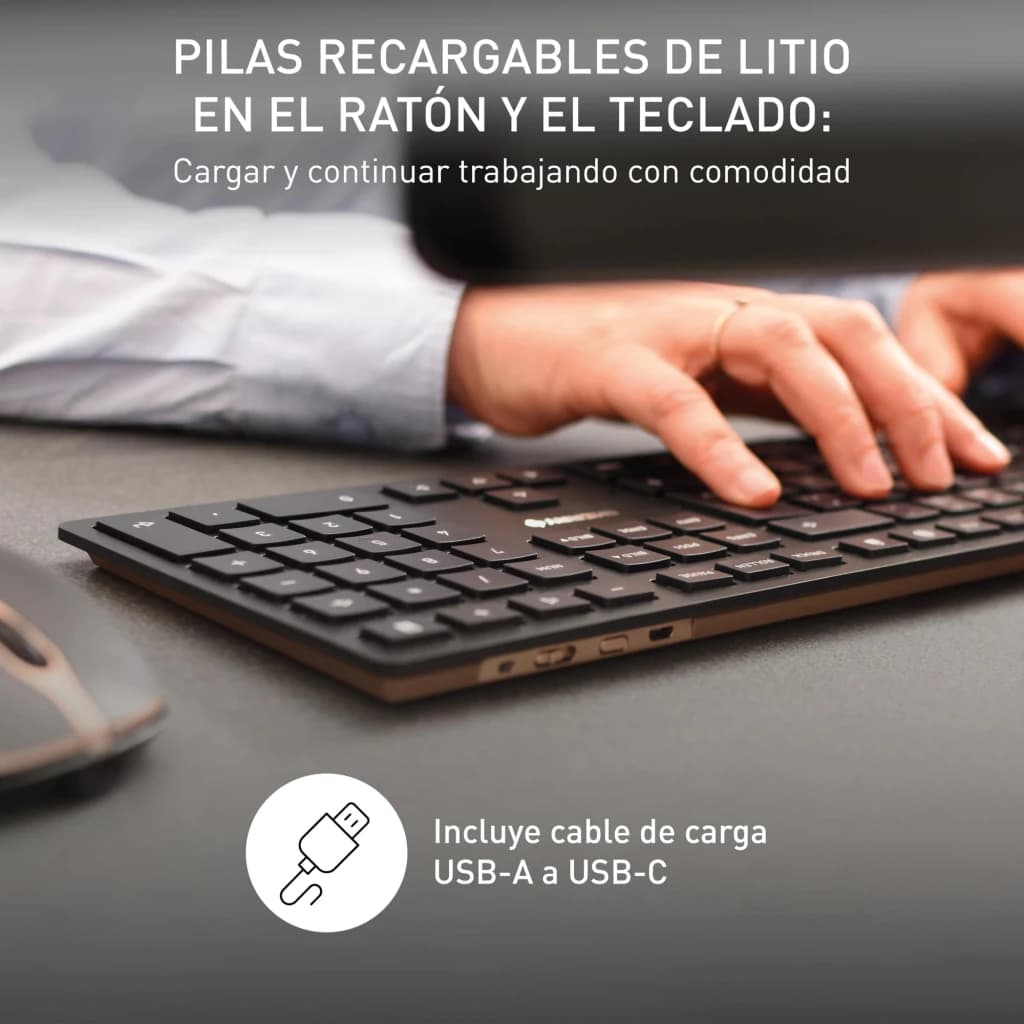 Cherry DW 9100 Slim noir, détail latéral: main tapant sur clavier noir avec port USB-C et souris en arrière-plan