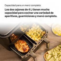 Braun TwinCook 3 TD 3030I BK 2x4L noir, tiroirs ouverts: poulet rôti dans un tiroir et rouleaux de courgette dans l'autre