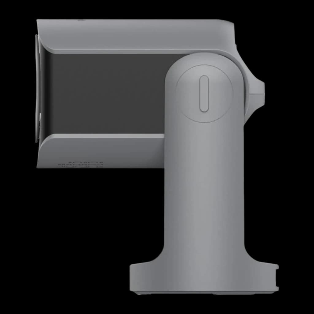 Philips NeoPix 156 cinza, vista lateral: perfil da cabeça inclinada, botão lateral e base cilíndrica sem lente visível