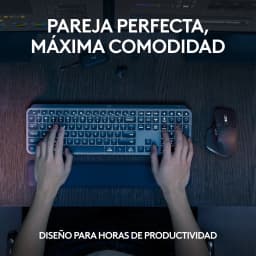 Logitech MX Keys S Combo Grafite, vista aérea: mãos digitando no teclado iluminado com rato MX Master em secretária