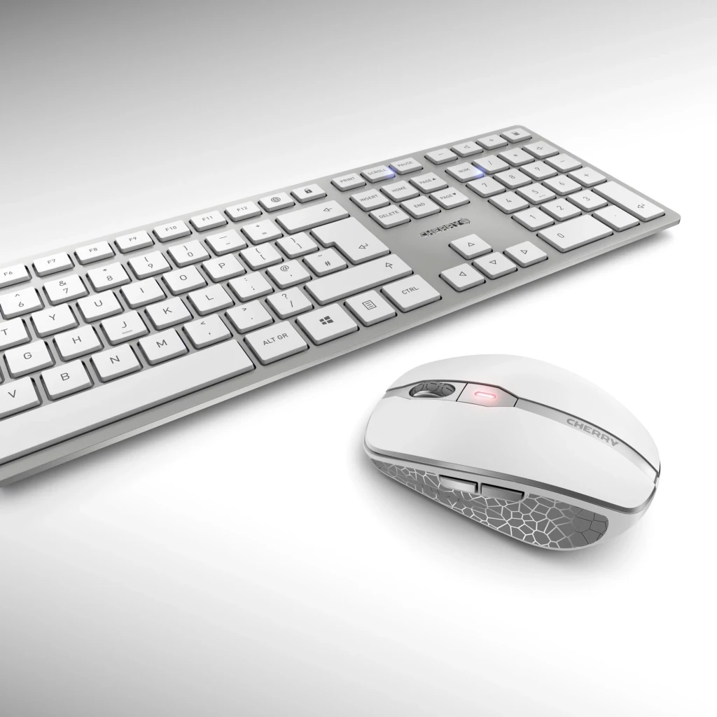 Cherry Kit teclado ratón inalámbrico DW 9100 Slim Plata, vista en perspectiva: teclado slim plateado y ratón con patrón
