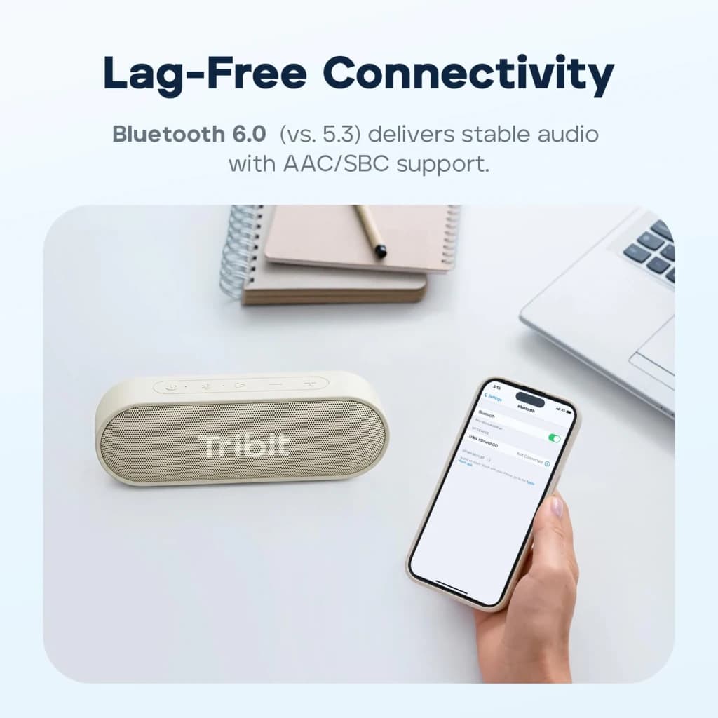 Enceinte Bluetooth Tribit XSound Go BTS58 20W 24h Blanc - couplée à un smartphone sur bureau
