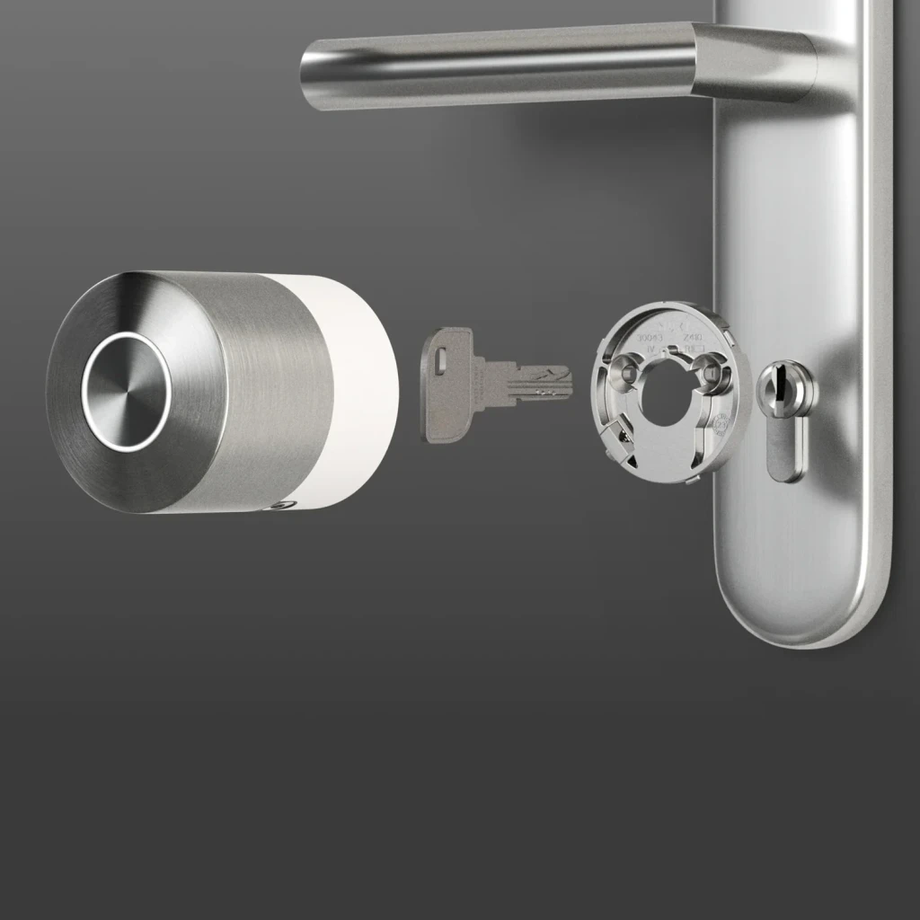 Fechadura inteligente Nuki Smart Lock Pro 5.ª Geração Matter em metal escovado, cilindro cilíndrico com botão central, placa e maçaneta prateadas,