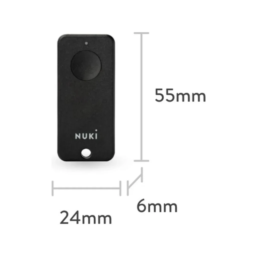 Chave de acesso Nuki Fob Bluetooth 1 botão, corpo retangular preto 55 x 24 x 6 mm, botão circular elevado e furo inferior para chaveiro, logotipo NUKI branco