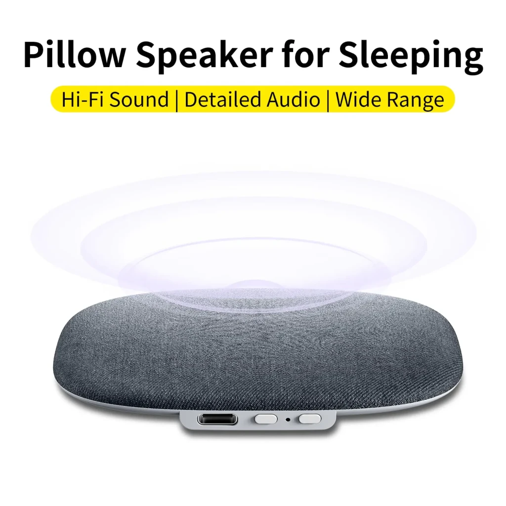 Enceinte oreiller gris compacte avec tissu chiné, boutons et port USB-C visibles, diffusion sonore enveloppante, idéale pour 8h d écoute Bluetooth 5.4