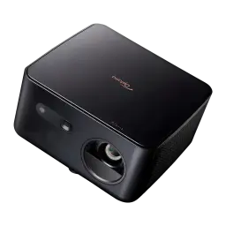 Optoma Photon Life PK32 4K UHD negro, vista diagonal superior: lente frontal, rejilla lateral y logo dorado en tapa