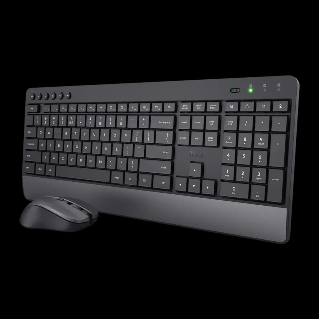 Trust Trezo Comfort noir, vue de face en angle: clavier complet avec repose-poignet et souris sans fil à gauche