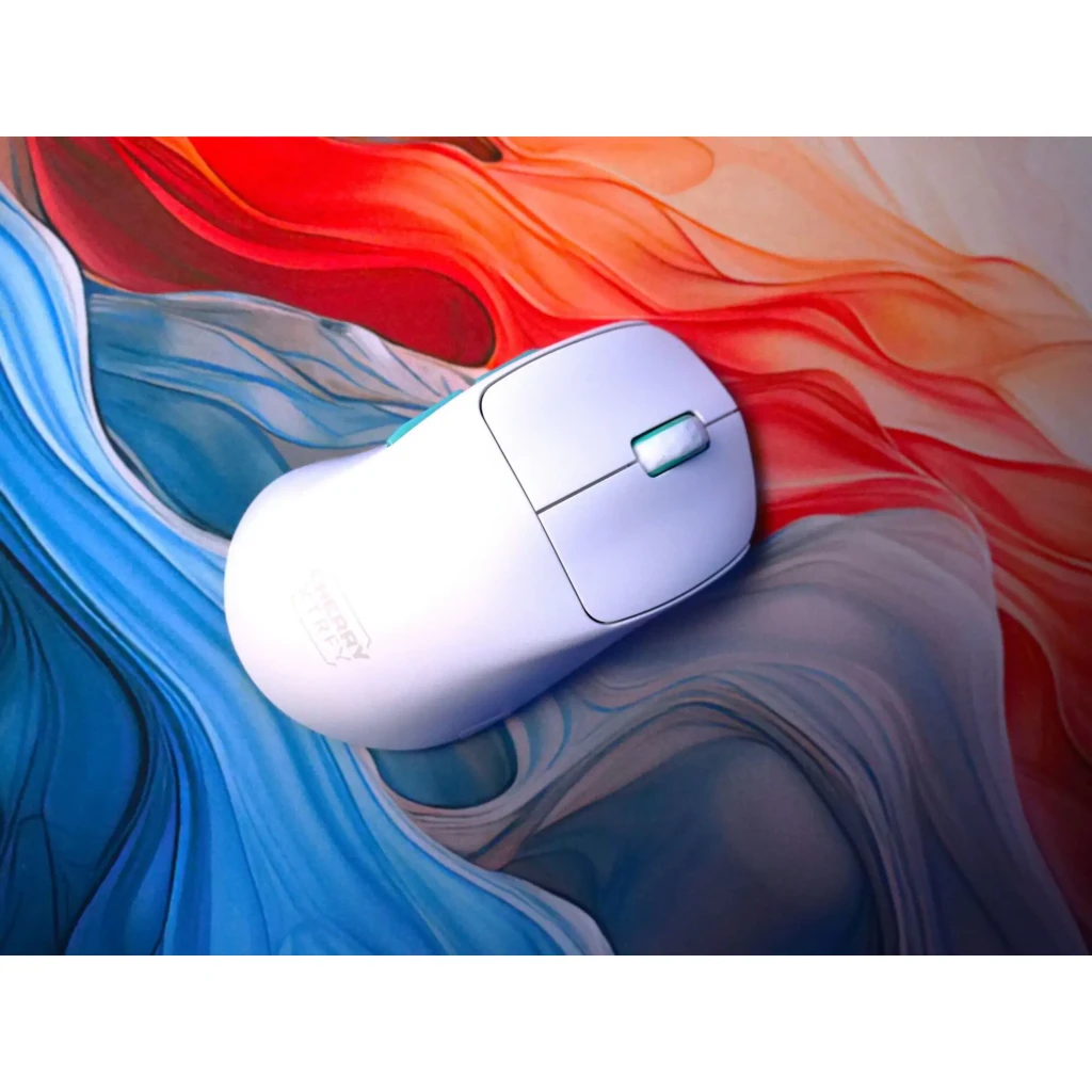Cherry XTRFY M64 Wireless blanc, vue de dessus: corps blanc mat, molette turquoise éclairée et logo XTRFY sur la base - Ítem3