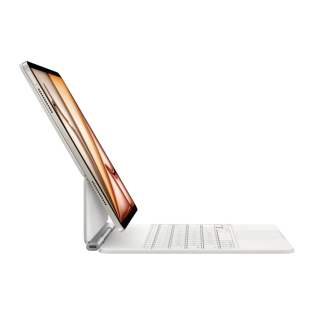 Apple TR Blanc, vue de face: écran allumé avec fond abstrait doré et rose, clavier blanc avec trackpad - Ítem3