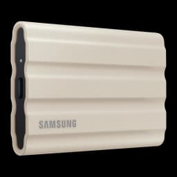 Samsung T7 Shield 2TB Beige, vue avant en angle: coque rainurée beige avec bords noirs et port USB-C visible