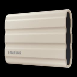 Samsung T7 Shield 2TB Beige, vue latérale en angle: coque rainurée beige avec embout noir sans port visible